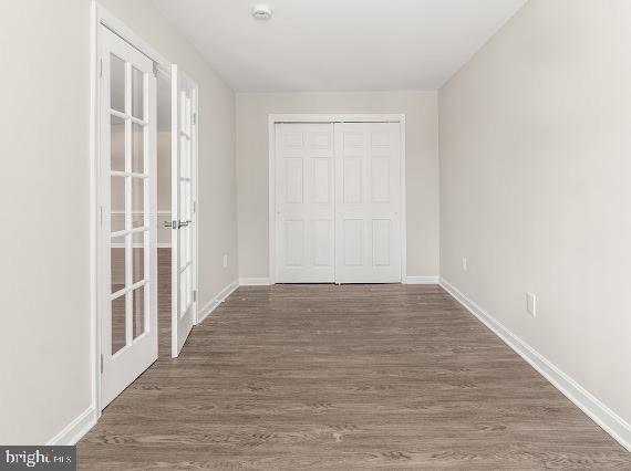 203 Star Pointe Court, Unit 2C Abingdon, MD 21009 - Photo 23 of 29 a view of an empty room with wooden floor
