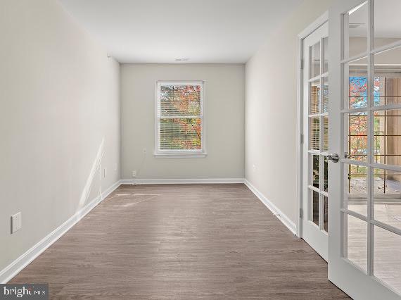 203 Star Pointe Court, Unit 2C Abingdon, MD 21009 - Photo 24 of 29 wooden floor in an empty room with a window