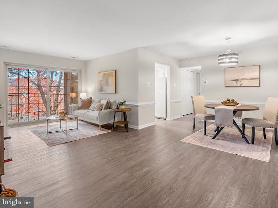 203 Star Pointe Court, Unit 2C Abingdon, MD 21009 - Photo 3 of 29 a living room with furniture and a wooden floor