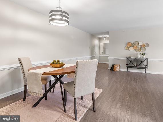 203 Star Pointe Court, Unit 2C Abingdon, MD 21009 - Photo 4 of 29 a view of a dining room with furniture window and wooden floor