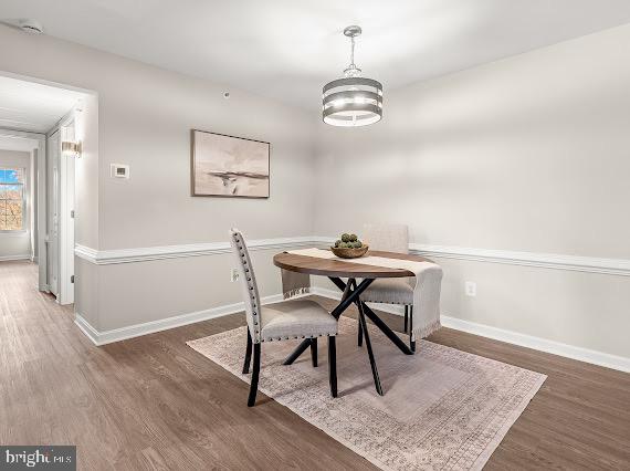 203 Star Pointe Court, Unit 2C Abingdon, MD 21009 - Photo 5 of 29 a view of a dining room with furniture and wooden floor