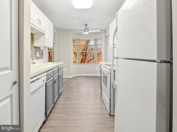 203 Star Pointe Court, Unit 2C Abingdon, MD 21009 - Photo 7 of 29 a view of a hallway with wooden floor and staircase