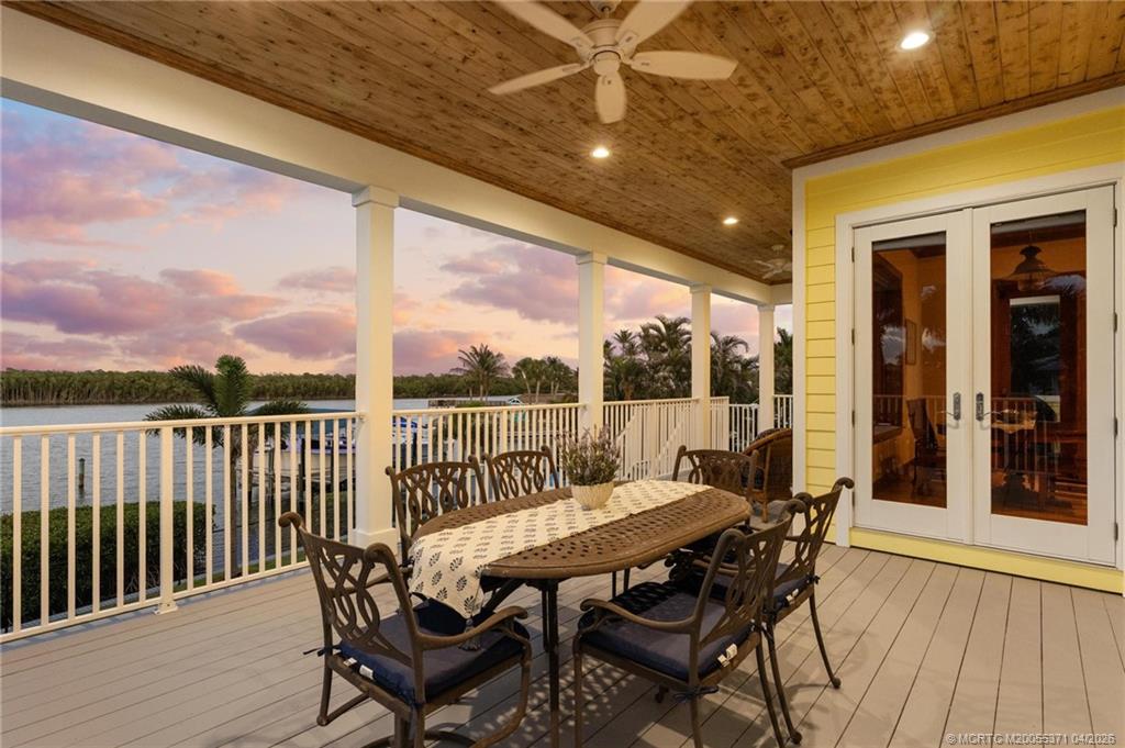 5675 Southeast Orange Street Stuart, FL 34997 - Photo 46 of 96 a view of a chairs and table in the balcony