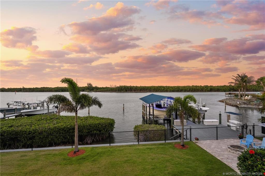 5675 Southeast Orange Street Stuart, FL 34997 - Photo 48 of 96 a view of a garden and lake view