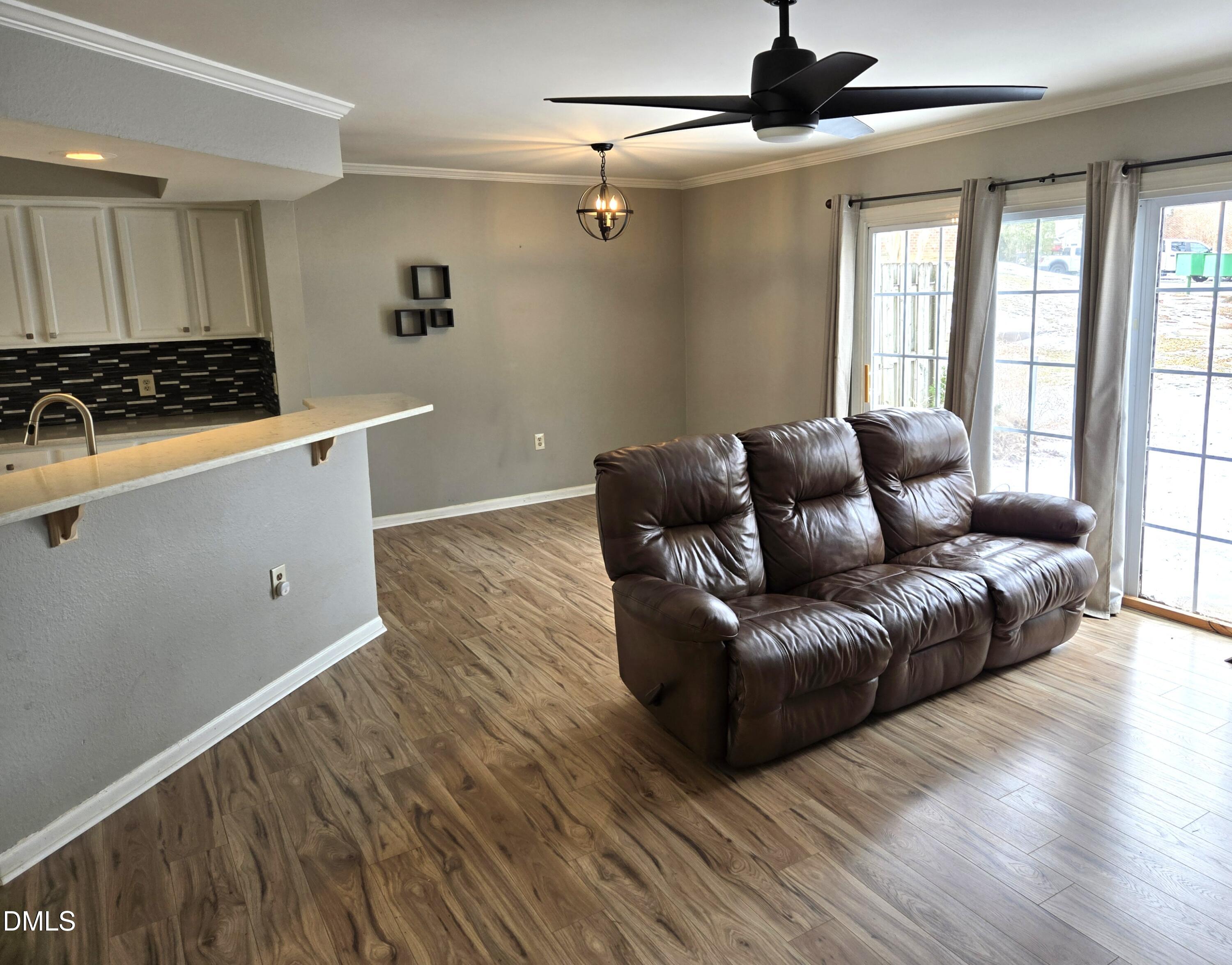 2400 Condor Court Raleigh, NC 27615 - Photo 11 of 22 Living Room and Kitchen Bar