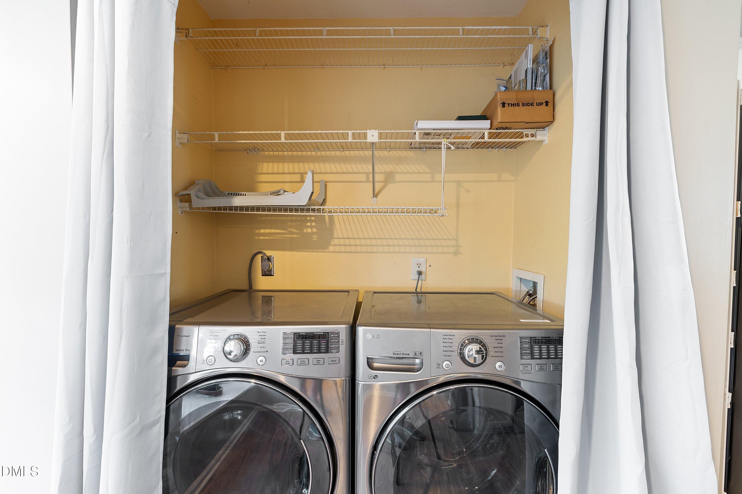 2400 Condor Court Raleigh, NC 27615 - Photo 17 of 40 a utility room with dryer and washer