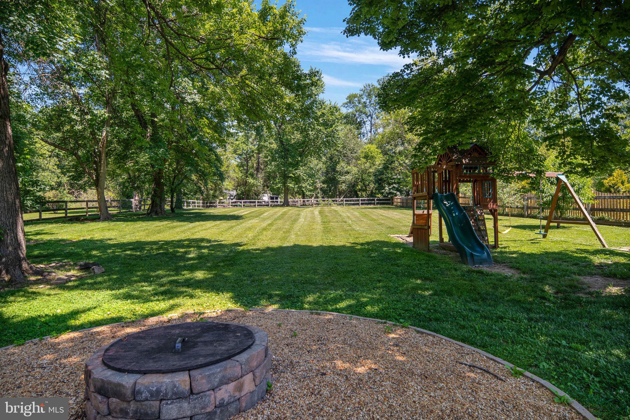 22202 Newlin Mill Road Middleburg, VA 20117 - Photo 4 of 37 Rear yard and fire pit