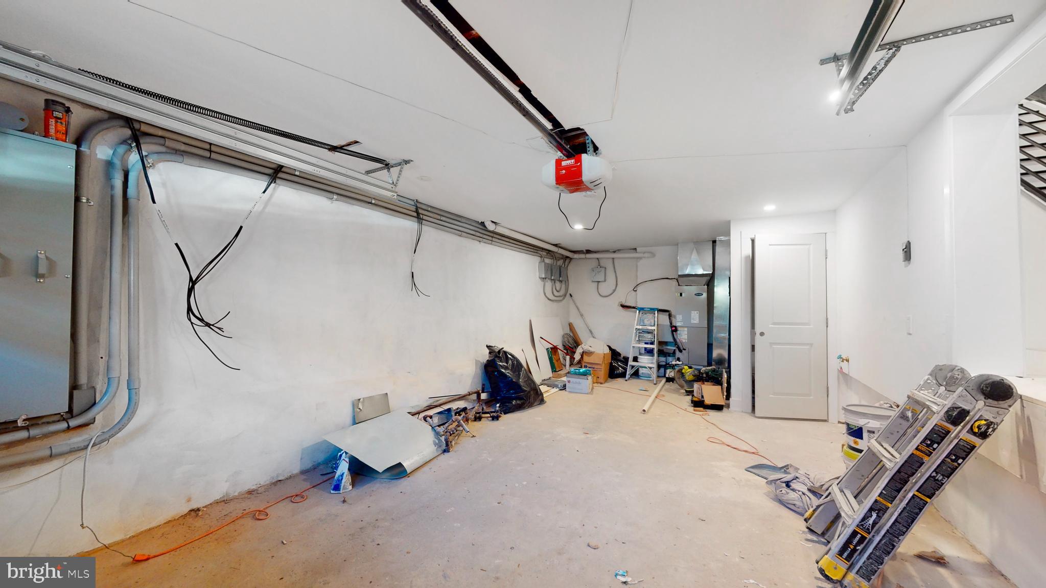 651 North 16th Street, Unit 2 Philadelphia, PA 19130 - Photo 13 of 19 a room with gym equipment and a mirror