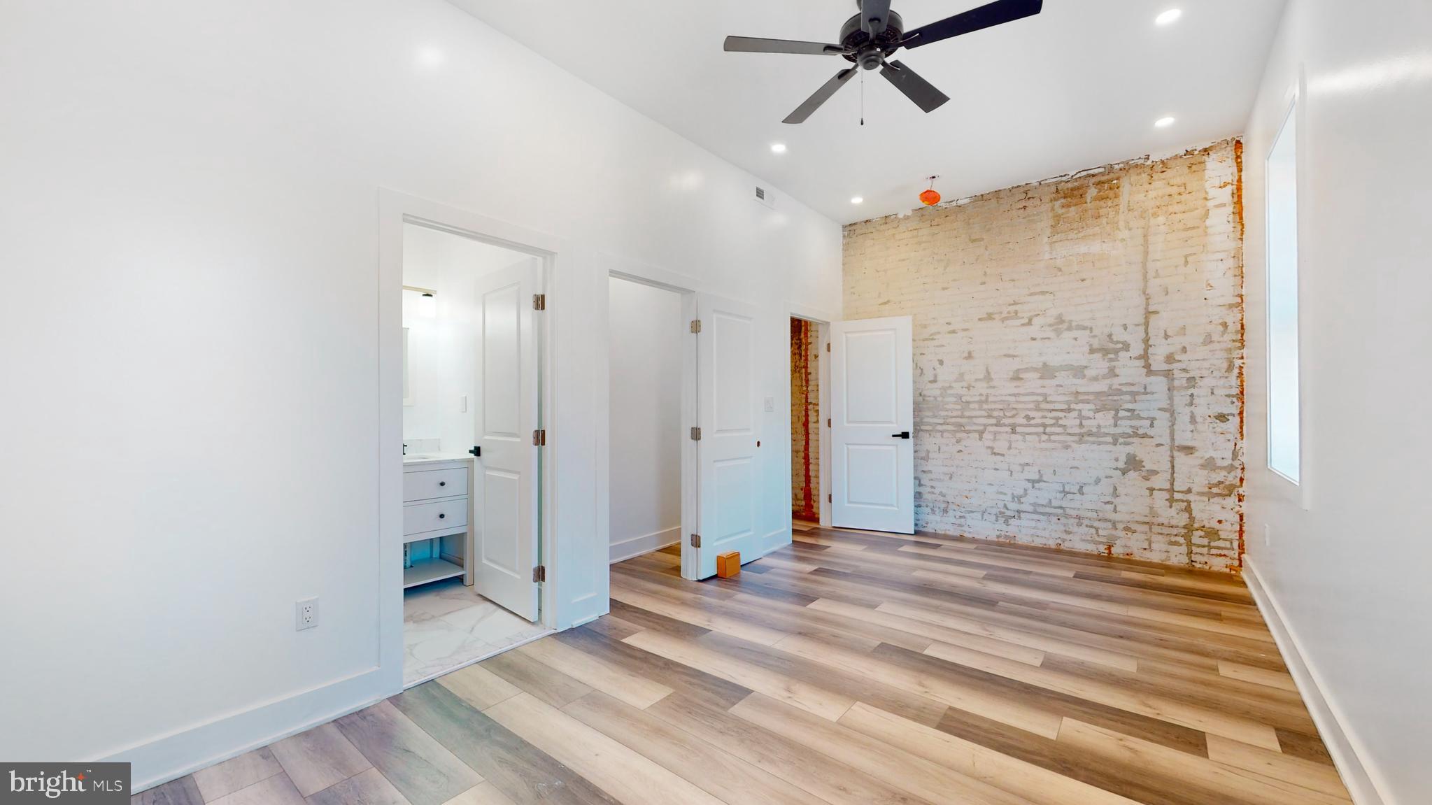 651 North 16th Street, Unit 2 Philadelphia, PA 19130 - Photo 7 of 19 a view of a bathroom with a shower and a sink