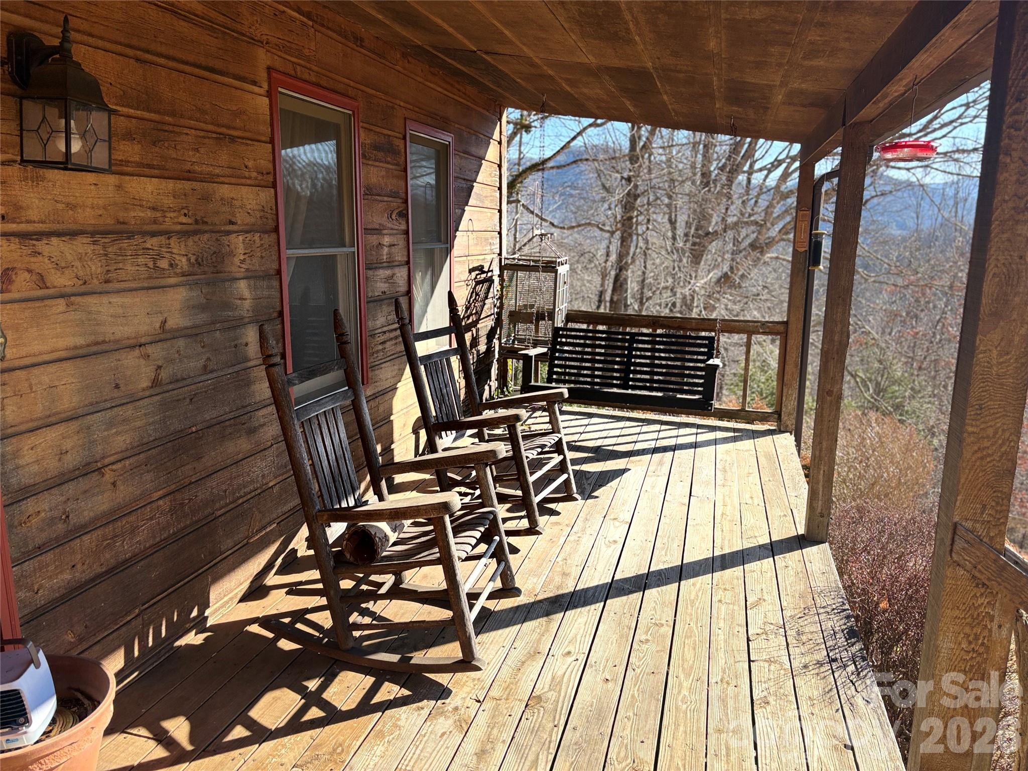 219 Rockinghorse Trail Burnsville, NC 28714 - Photo 8 of 31 a view of balcony with wooden floor