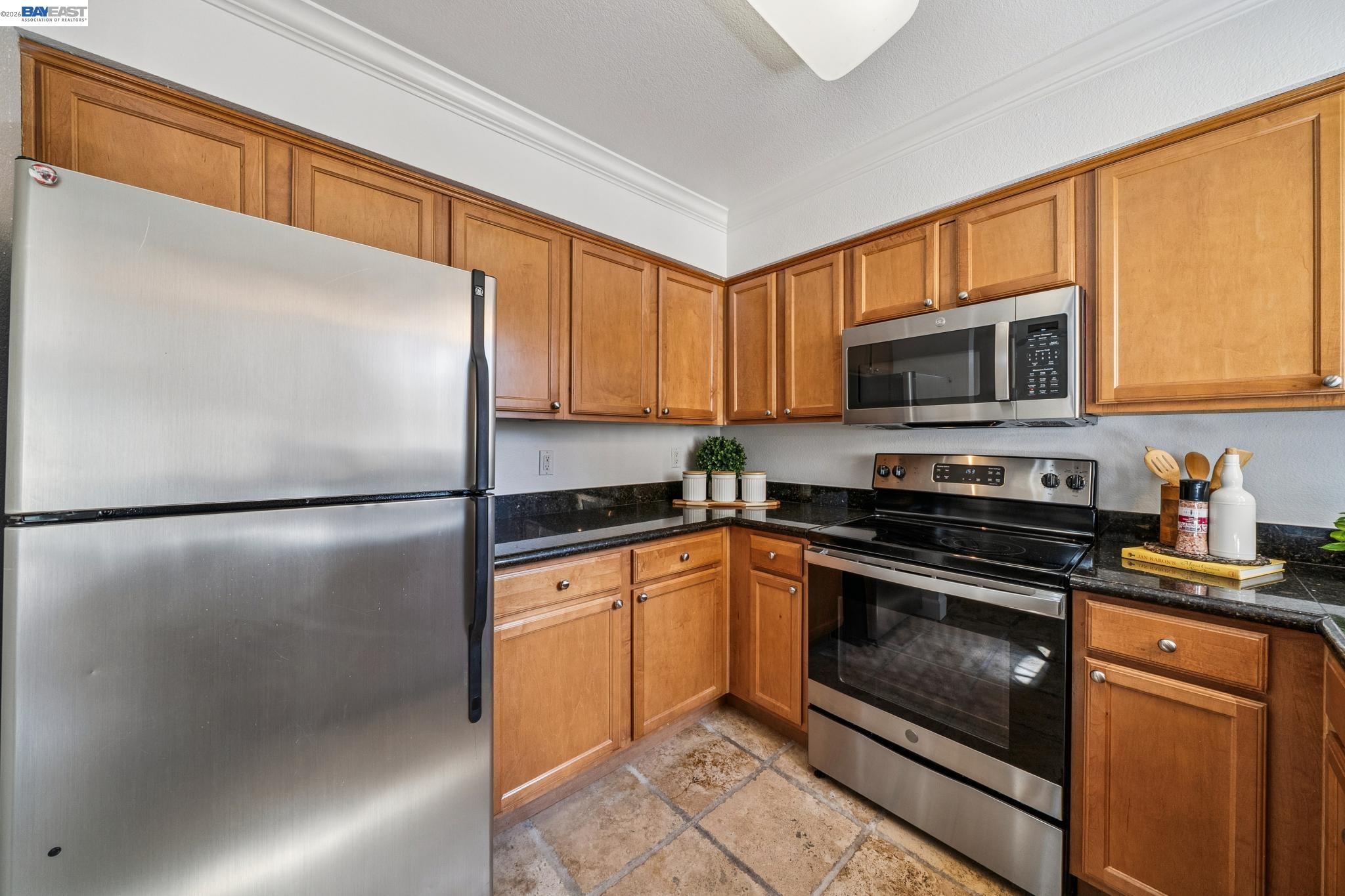 182 Eastridge Drive San Ramon, CA 94582 - Photo 13 of 54 a kitchen with a refrigerator stove and microwave