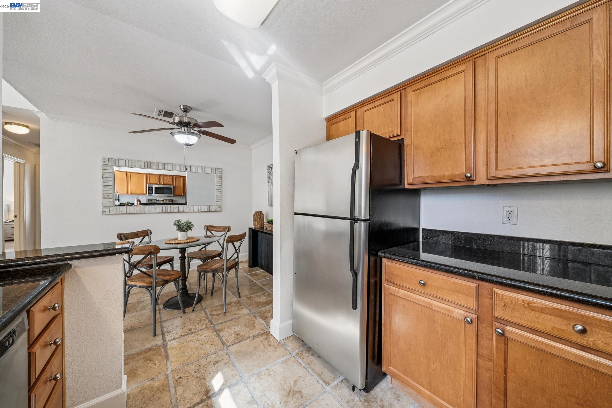 182 Eastridge Drive San Ramon, CA 94582 - Photo 15 of 54 a kitchen with stainless steel appliances granite countertop a refrigerator a stove and a sink with granite countertops