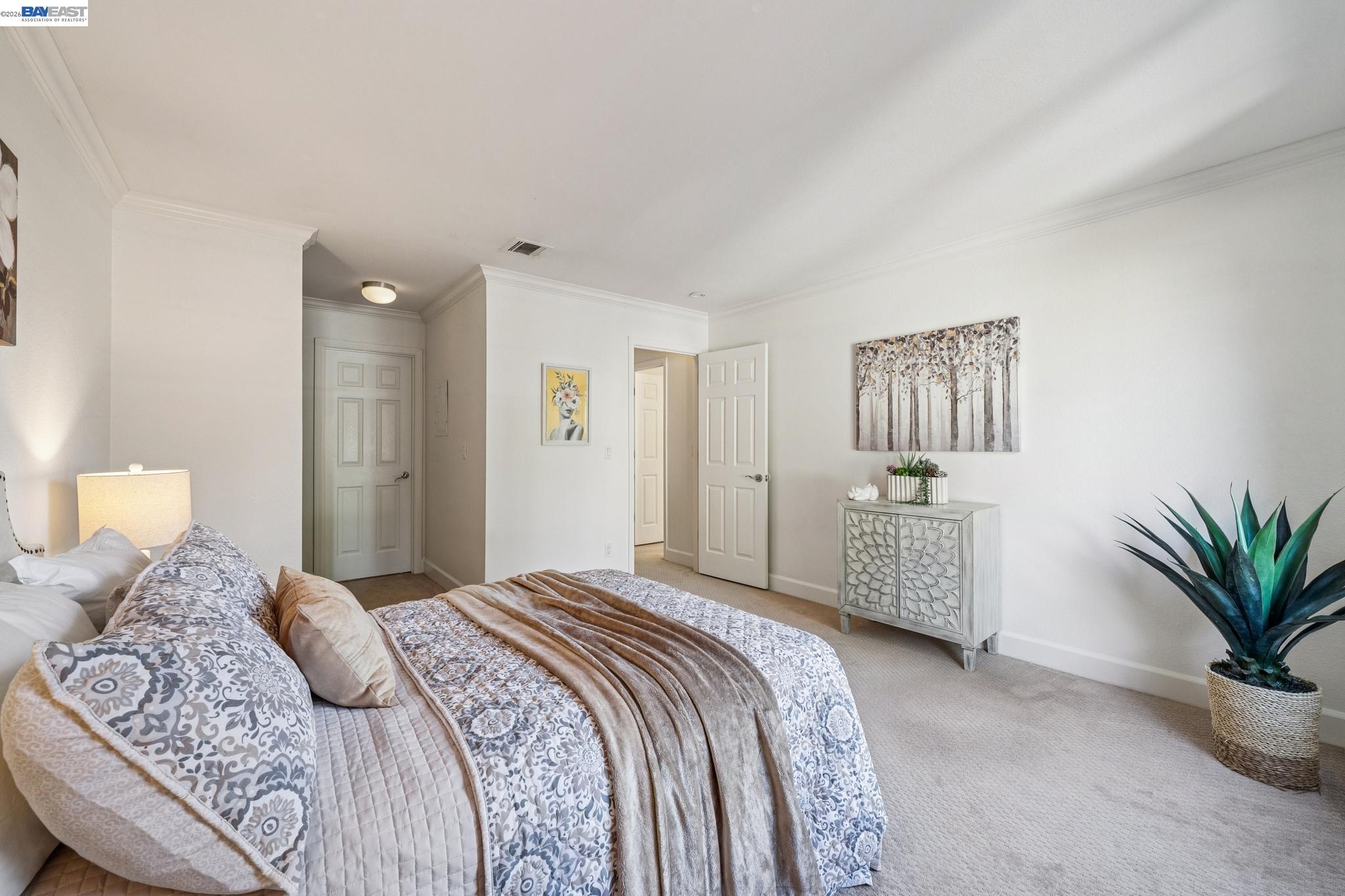 182 Eastridge Drive San Ramon, CA 94582 - Photo 27 of 54 a bedroom with a large bed and a potted plant