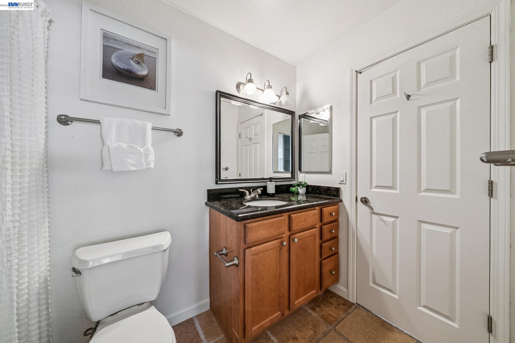 182 Eastridge Drive San Ramon, CA 94582 - Photo 29 of 54 a bathroom with a stove a sink and a mirror