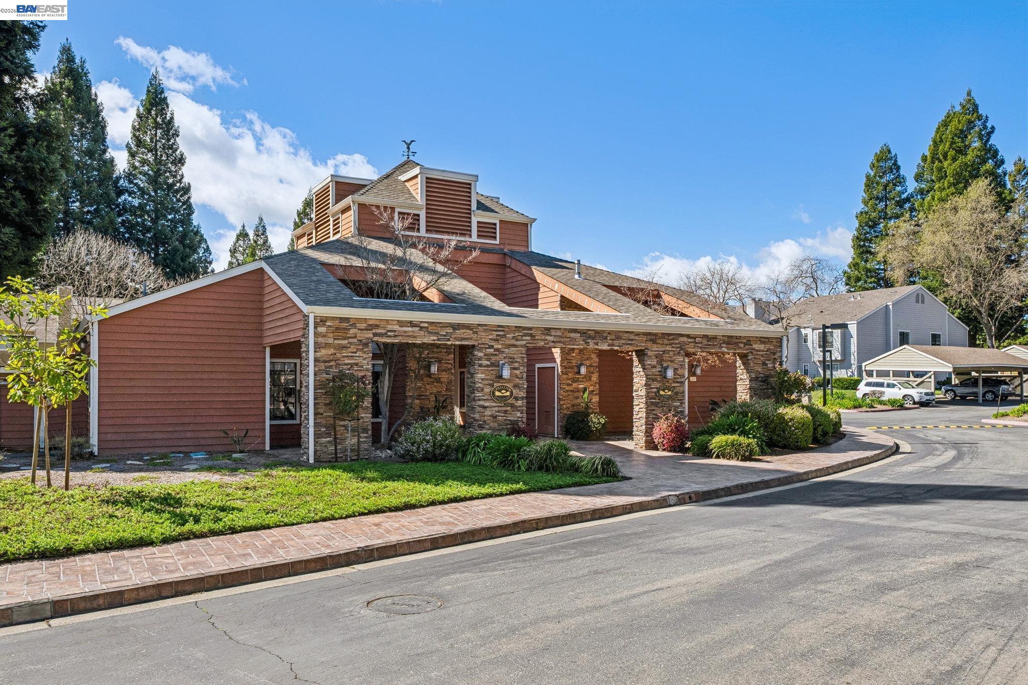 182 Eastridge Drive San Ramon, CA 94582 - Photo 42 of 54 a front view of a house with a garden and plants