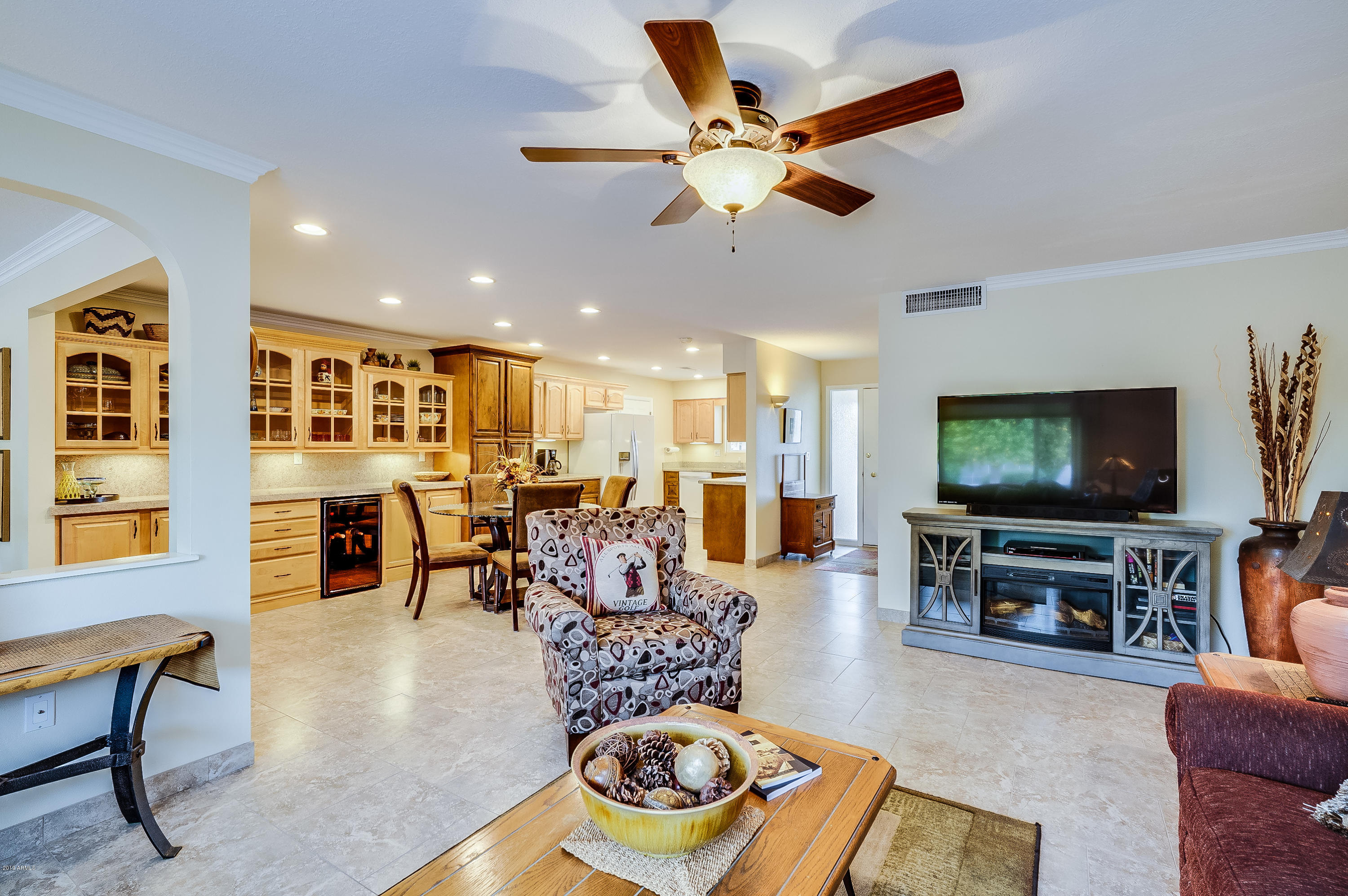 10460 West White Mountain Road Sun City, AZ 85351 - Photo 3 of 28 Living room/kitchen