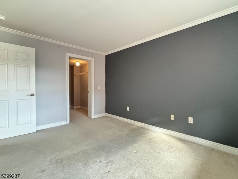 7 Prospect Street, Unit 507 Morristown, NJ 07960 - Photo 5 of 13 a view of an empty room with closet area