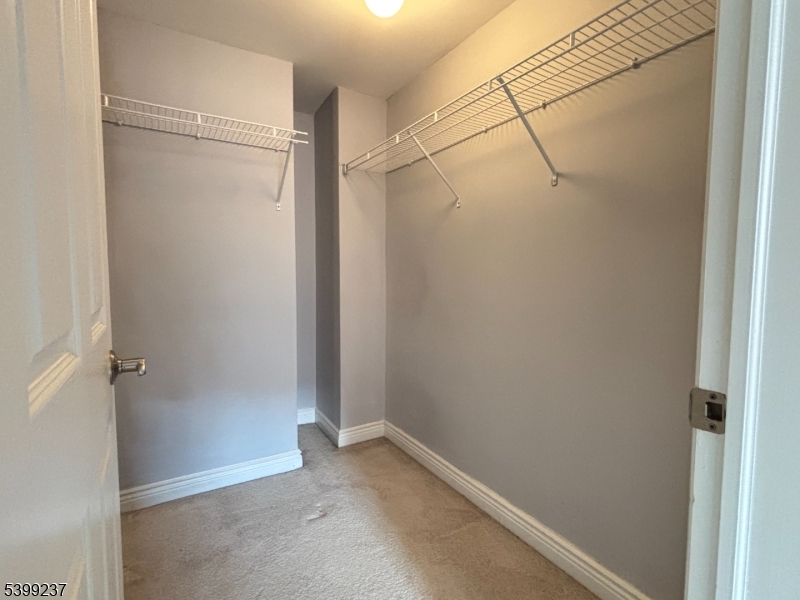 7 Prospect Street, Unit 507 Morristown, NJ 07960 - Photo 6 of 13 a view of a room with racks on the wall