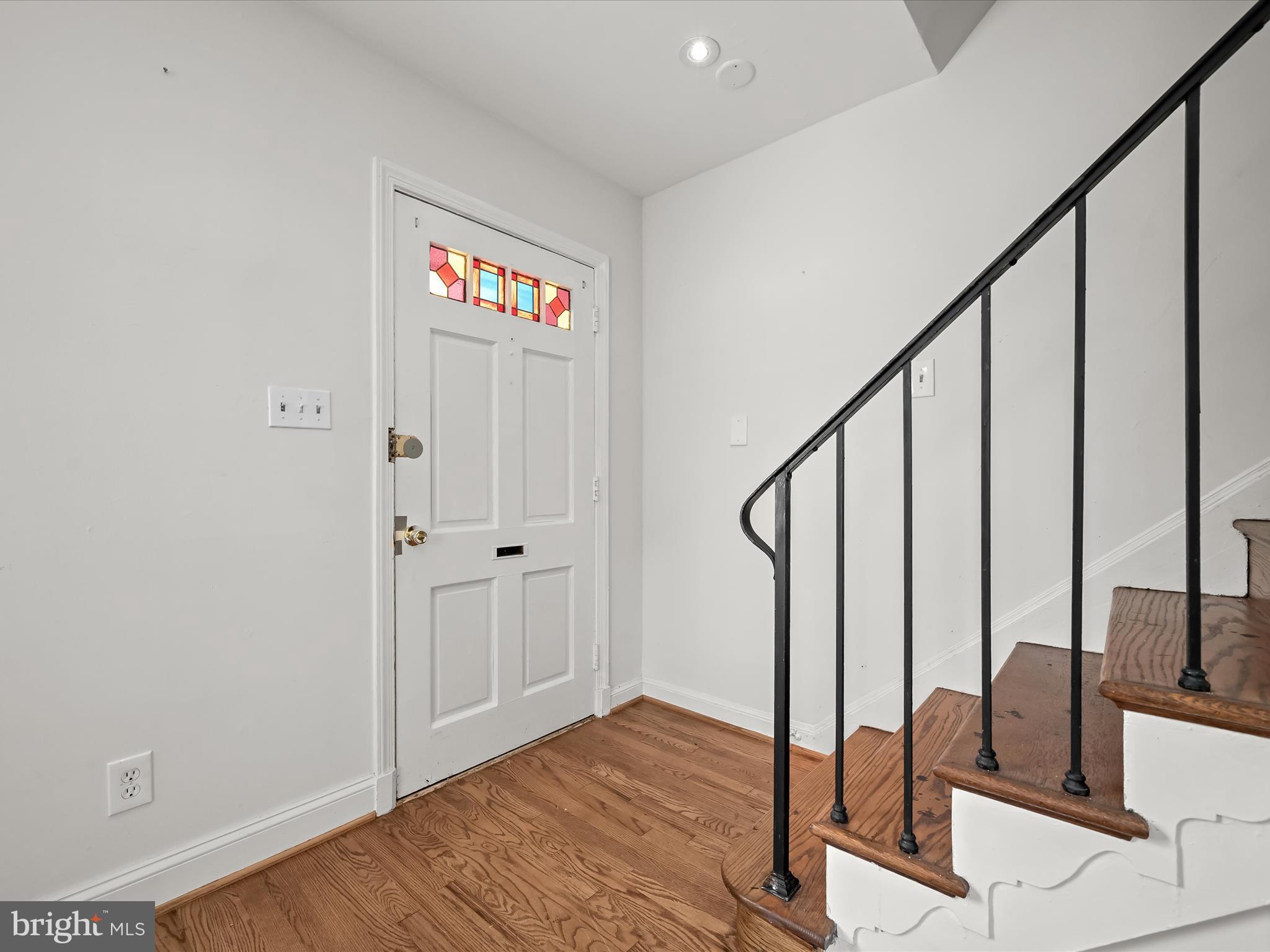 1776 East W Highway, Unit 1776 Silver Spring, MD 20910 - Photo 15 of 31 a view of an entryway with wooden floor