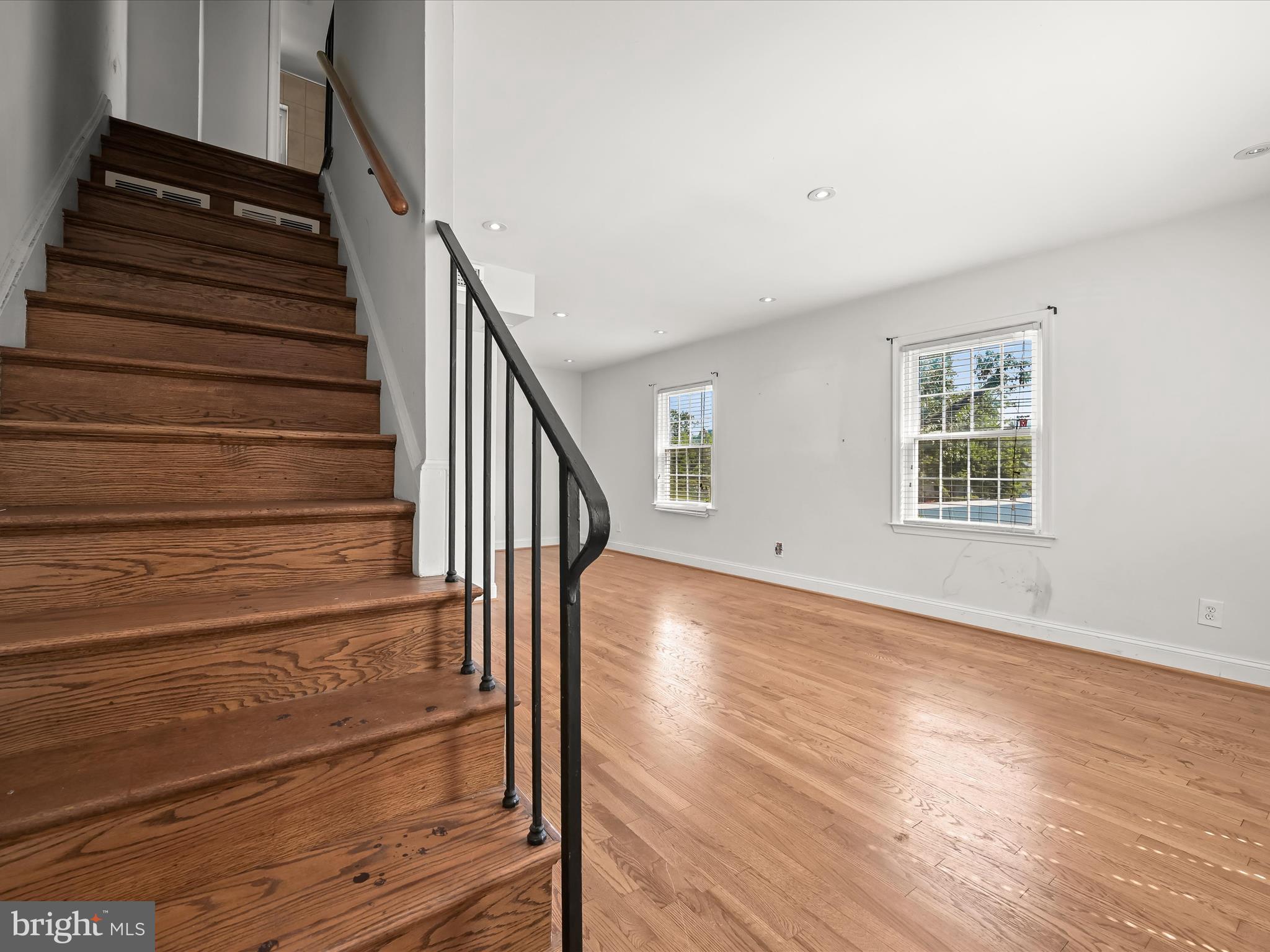 1776 East W Highway, Unit 1776 Silver Spring, MD 20910 - Photo 2 of 31 a view of entryway and hall with wooden floor