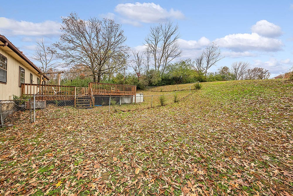 700 Butler Mill Road Oliver Springs, TN 37840 - Photo 5 of 16 a large body of water with a building in the background