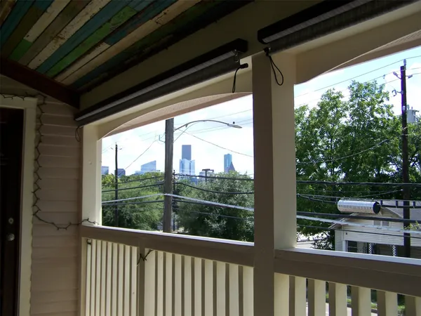 a view of a porch and garden
