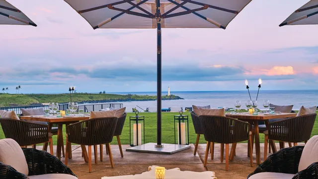 a view of a balcony with chairs