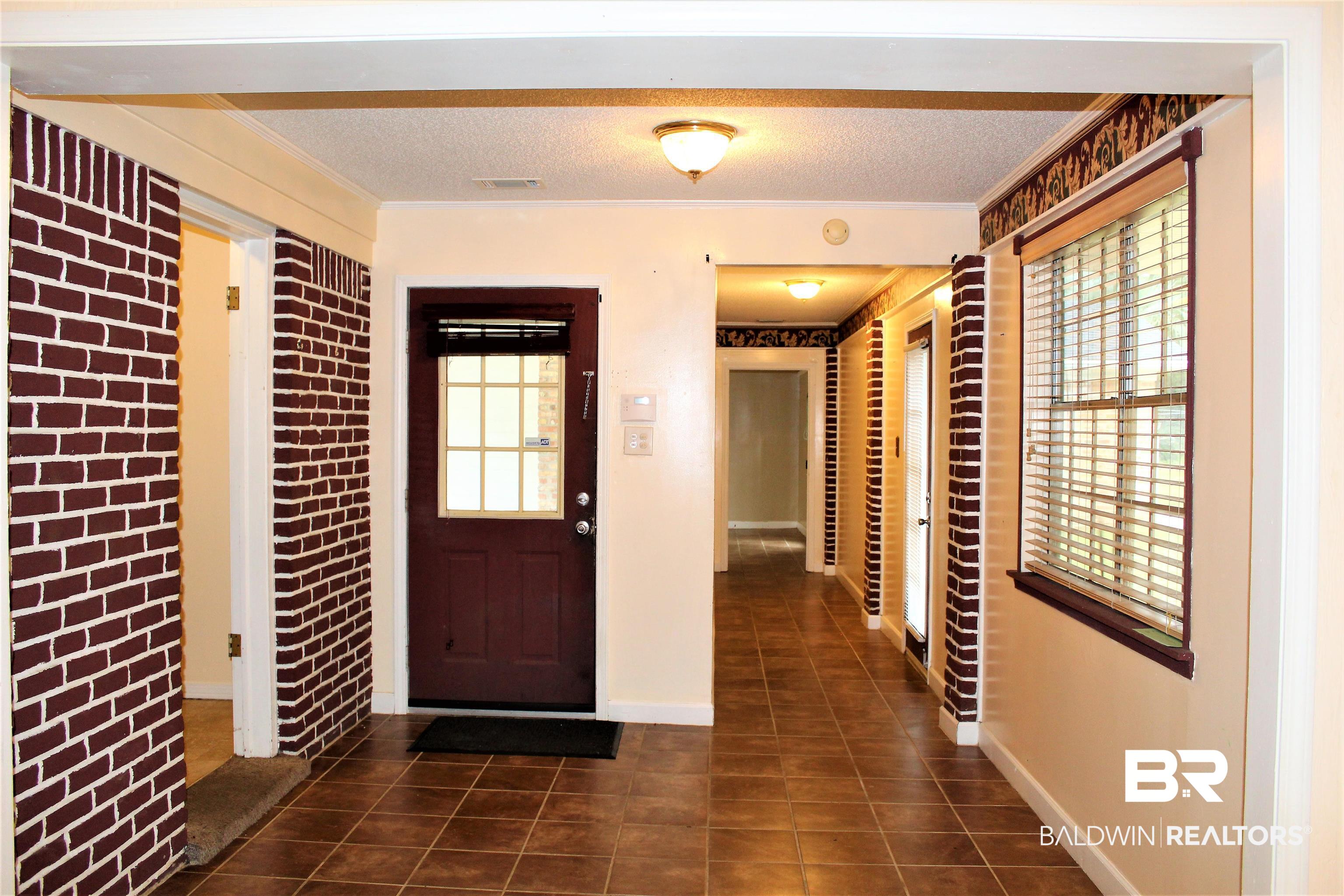 4251 Schillinger Road South Mobile, AL 36619 - Photo 5 of 38 Large entryway leads to 2 separate living areas