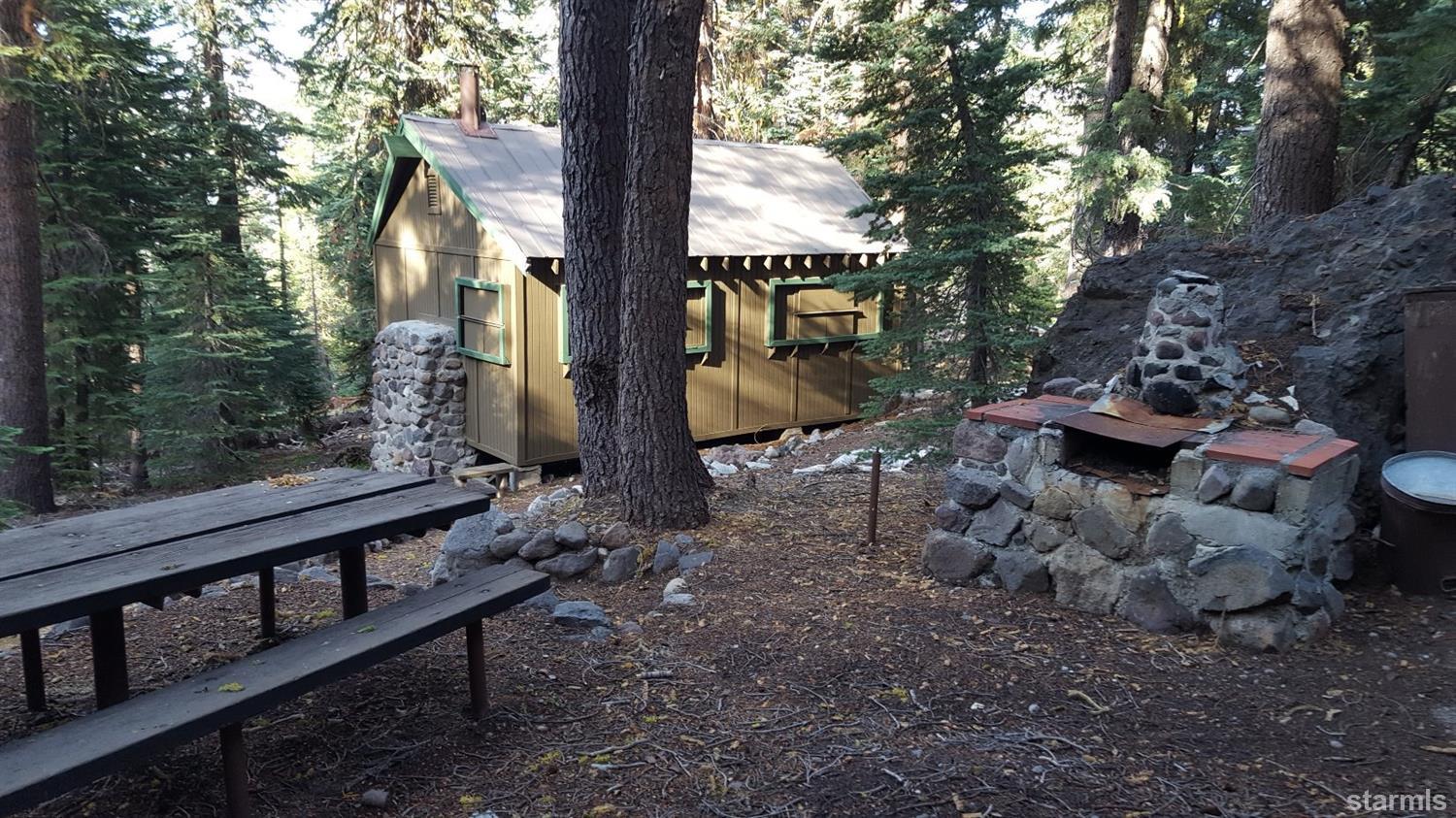 50300 Devils Gate Road, Unit 3 Kirkwood, CA 95646 - Photo 2 of 11 Outdoor cooking and picnic table behind cabin.