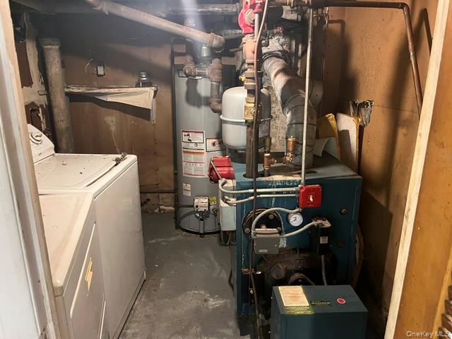 42-36 156th Street Queens, NY 11355 - Photo 4 of 12 a utility room with dryer and washer