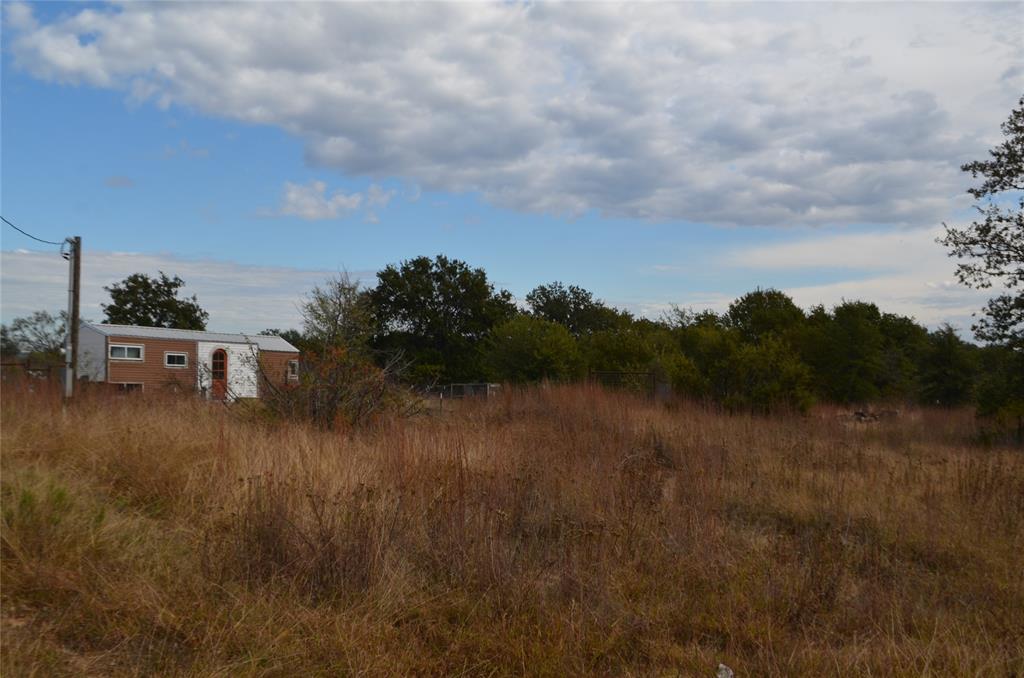 3470 Old Agnes Road Weatherford, TX 76088 - Photo 3 of 12 a view of a lake with houses in back