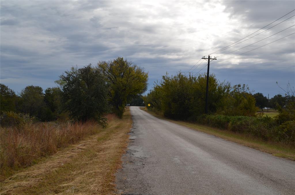 3470 Old Agnes Road Weatherford, TX 76088 - Photo 5 of 12 a view of a pathway with a lake
