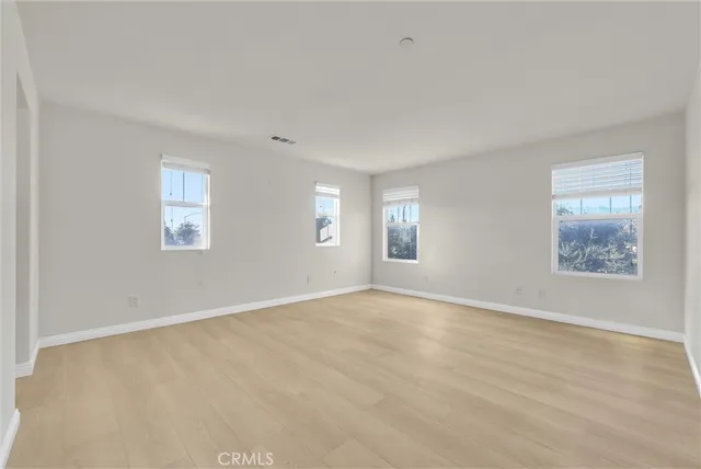 an empty room with windows