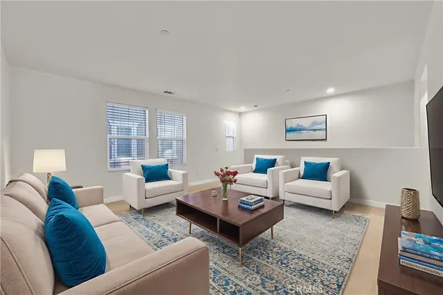 a living room with furniture and a couch