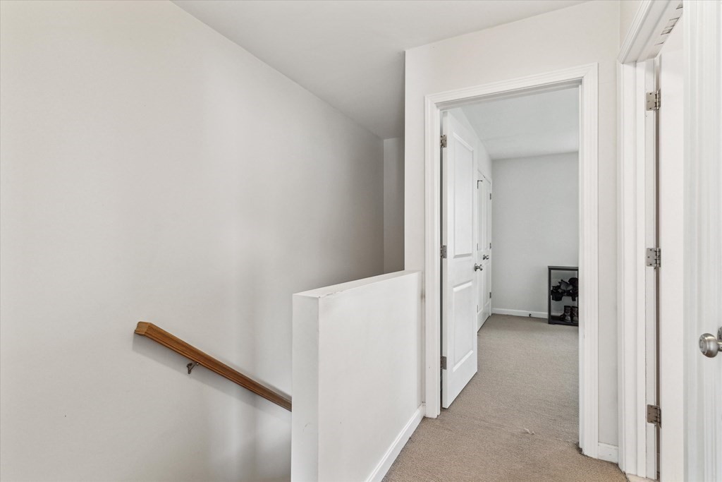 6 Bates Street, Unit B Devens, MA 01434 - Photo 17 of 30 a view of a hallway with closet