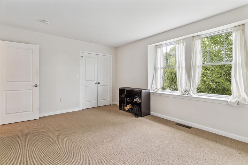 6 Bates Street, Unit B Devens, MA 01434 - Photo 21 of 30 a view of an empty room with a window
