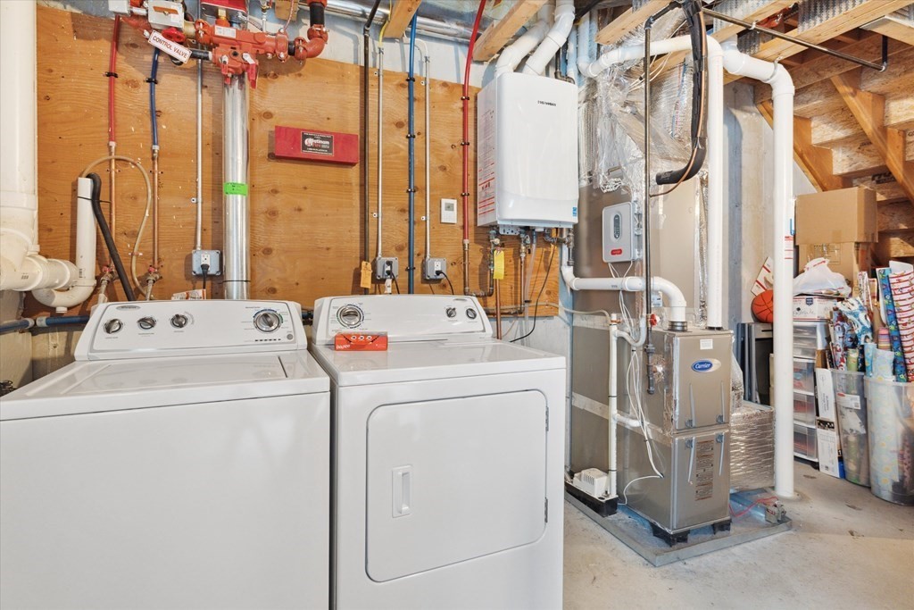 6 Bates Street, Unit B Devens, MA 01434 - Photo 24 of 30 a utility room with dryer and washer