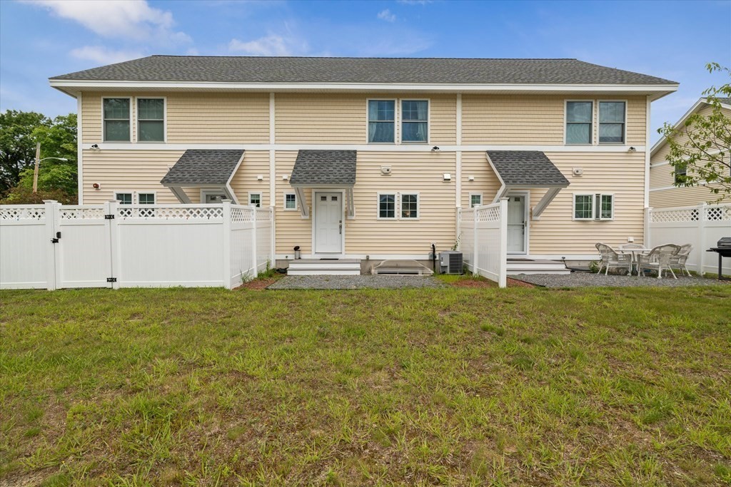 6 Bates Street, Unit B Devens, MA 01434 - Photo 27 of 30 front view of a house with a yard