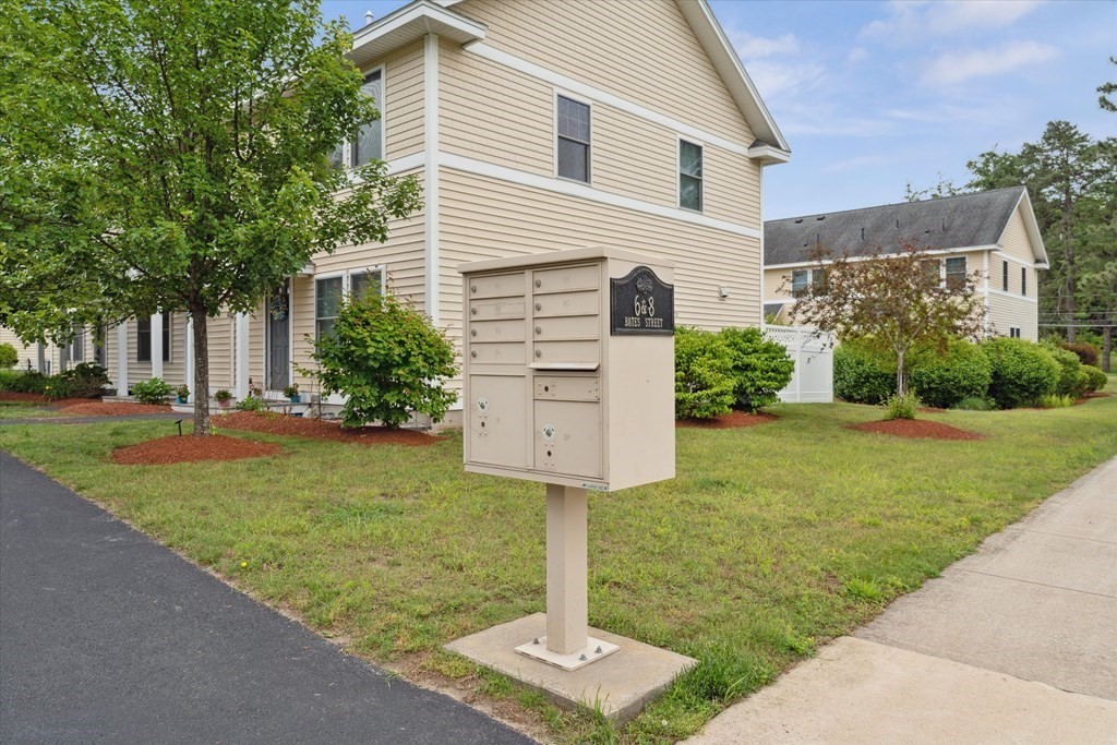 6 Bates Street, Unit B Devens, MA 01434 - Photo 30 of 30 a front view of a house with garden