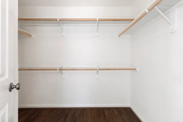 a view of an empty walk in closet
