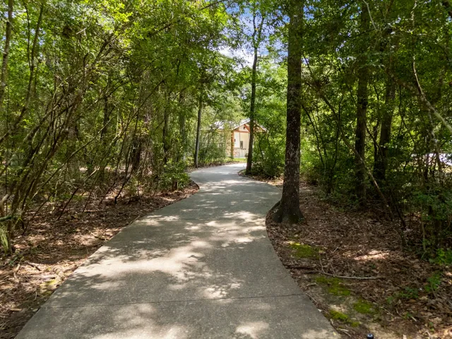 a sign that is sitting on a rock