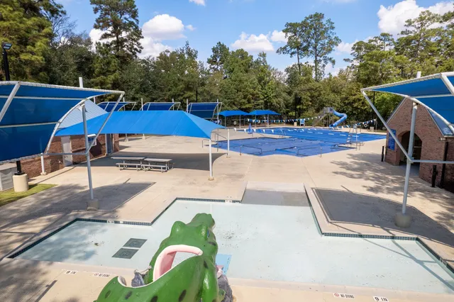 a view of a park with swings