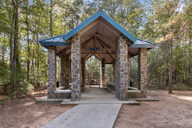 a view of yard with swimming pool