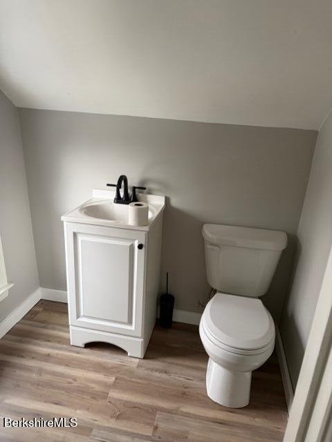 63 Addison Street North Adams, MA 01247 - Photo 11 of 17 a white toilet sitting next to a bathroom sink