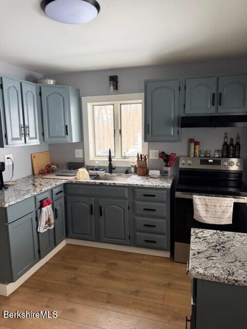 63 Addison Street North Adams, MA 01247 - Photo 3 of 17 a kitchen with granite countertop a sink cabinets and stainless steel appliances