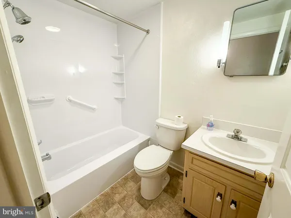 a room with a sink and a window