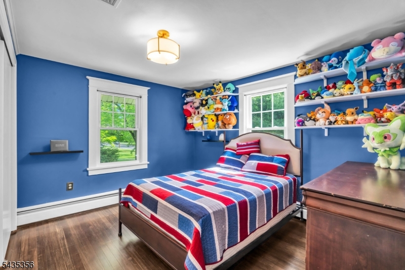 105 Somerville Road Bedminster, NJ 07921 - Photo 17 of 36 a bedroom with a bed and a window in it