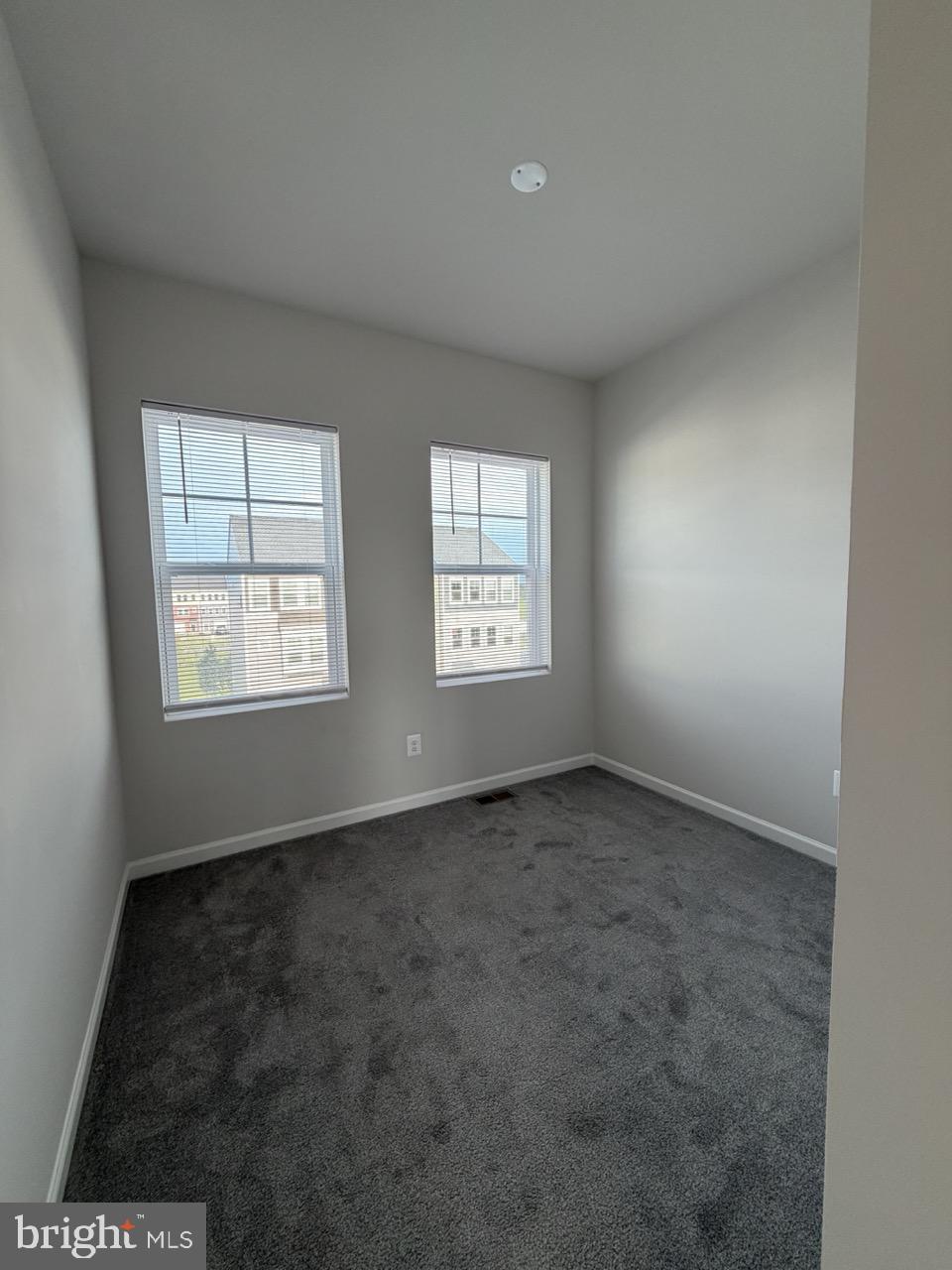 146 Galaxy Place Stephenson, VA 22656 - Photo 37 of 46 an empty room with windows