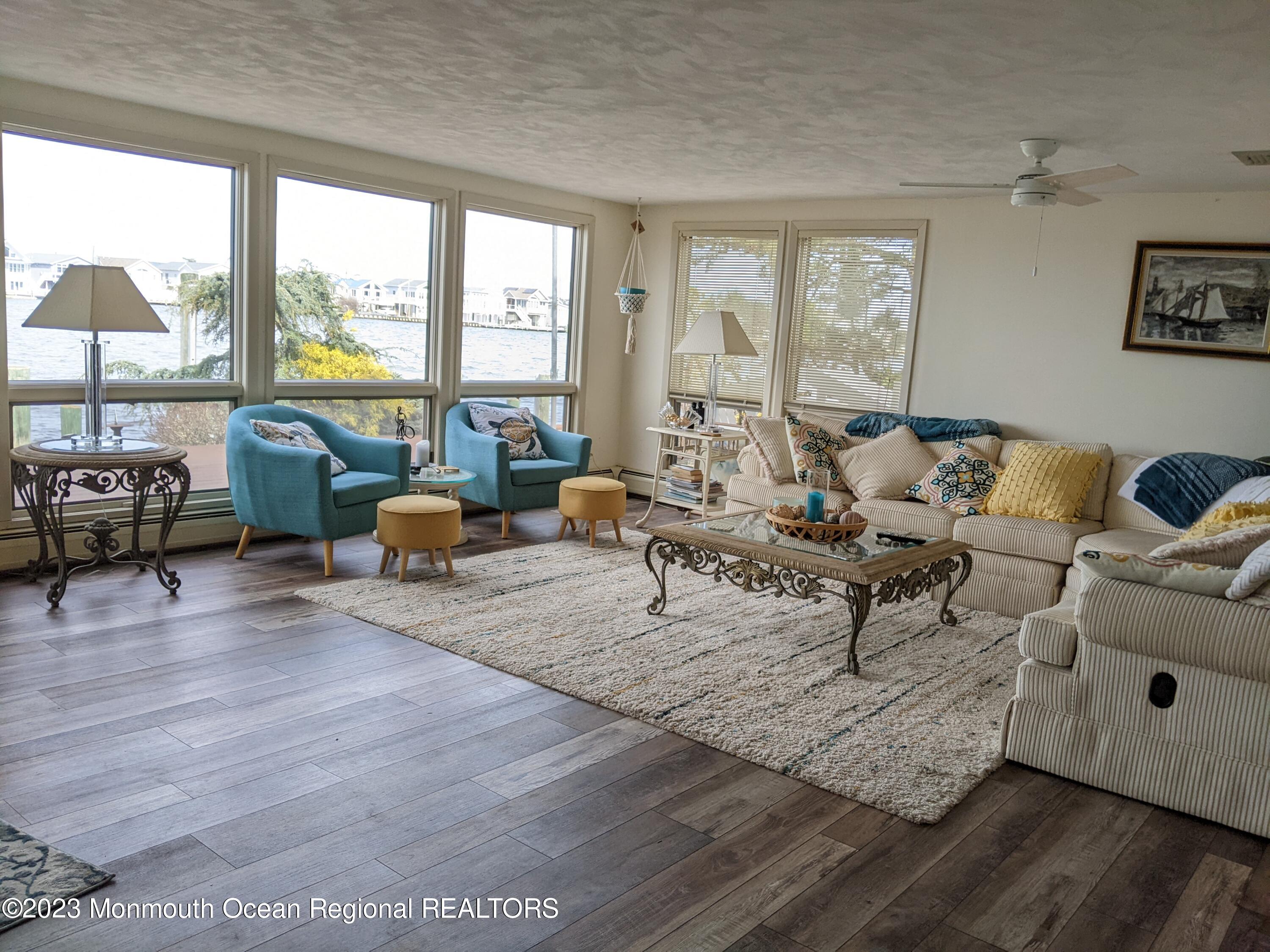 289 Monterey Circle Lavallette, NJ 08735 - Photo 17 of 32 a living room with furniture and a large window