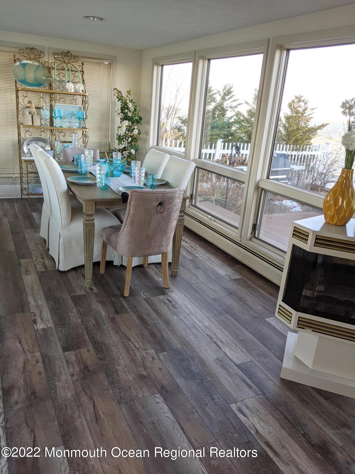 289 Monterey Circle Lavallette, NJ 08735 - Photo 21 of 32 a dining room with furniture window and wooden floor